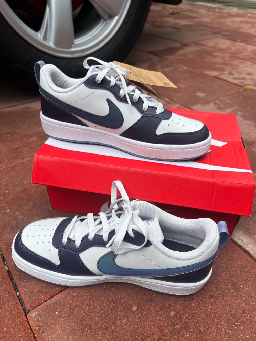 Nike Kids or Womens Low-Top Sneakers in White and Navy with Steel Blue Swoosh